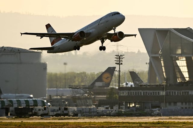 A Lufthansa plane is seen at sunset at the airport in Frankfurt am Main, western Germany, in April. Photo: AFP