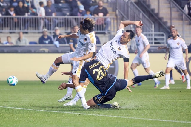 The Galaxy’s Miki Yamane, left, and Maya Yoshida compete for the ball against Philadelphia’s Bruno Damiani on May 14, 2025, at Subaru Park in Chester, Pennsylvania. (Photo by Isaiah Vazquez/Getty Images)