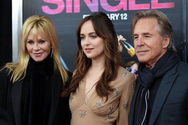 Actors Melanie Griffith, Dakota Johnson, and Don Johnson attend the New York premiere of &#34;How To Be Single&#34; at the NYU Skirball Center on February 3, 2016 in New York City. In a new interview, Dakota Johnson revealed she struggled financially in her early career after her father, actor Don Johnson, ended his support when she didn&#39;t go to college.