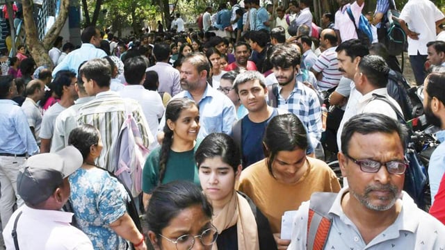 Candidates arrive to appear for the Common University Entrance Test - Undergraduate (CUET-UG) 2025 exam at Shakti Nagar in New Delhi on May 13. (Sanjeev Verma/HT Photo)