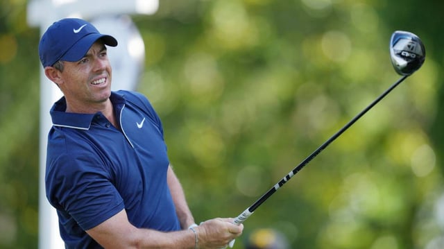 Rory McIlroy tees off on the third hole during the third round of the PGA Championship golf tournament at Quail Hollow.