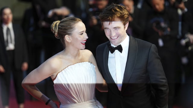 Jennifer Lawrence, left, and Robert Pattinson pose for photographers upon arrival at the premiere of the film 'Die, My Love' at the 78th International Cannes Film Festival. 