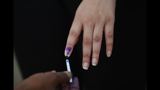 Lucknow, India May 20, 2024:::A female voter gets her finger marked with Indelible ink before casting her vote at Hazratganj polling station during the fifth phase of Lok Sabha Election in Lucknow, Uttar Pradesh India on Monday, 20, 2024. (Photo by Deepak Gupta/ Hindustan Times) (HT Photo)