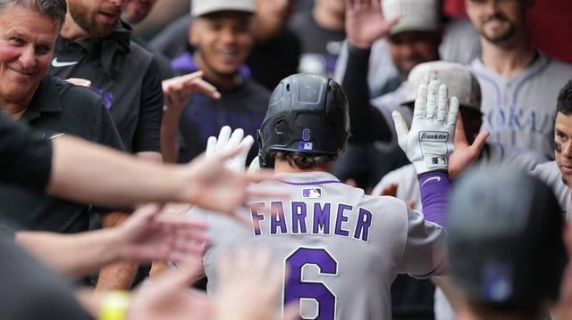 May 17, 2025; Phoenix, Arizona, USA; Colorado Rockies first baseman Kyle Farmer (6) celebrates two run home run with teammates against the Arizona Diamondbacks in the third inning at Chase Field. Mandatory Credit: Jacob Reiner-Imagn Images