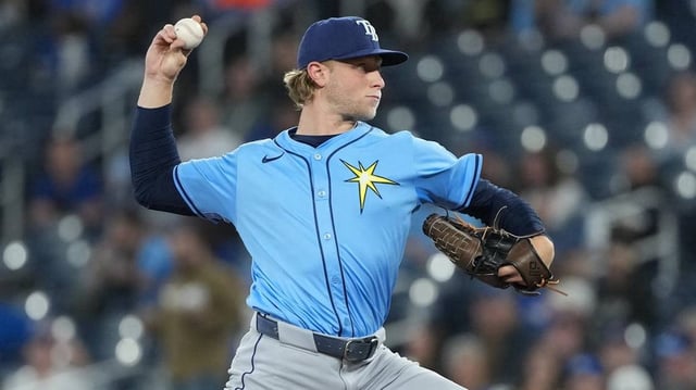 May 13, 2025; Toronto, Ontario, CAN; Tampa Bay Rays starting pitcher Shane Baz (11) throws a pitch against the Toronto Blue Jays during the first inning at Rogers Centre. Mandatory Credit: Nick Turchiaro-Imagn Images
