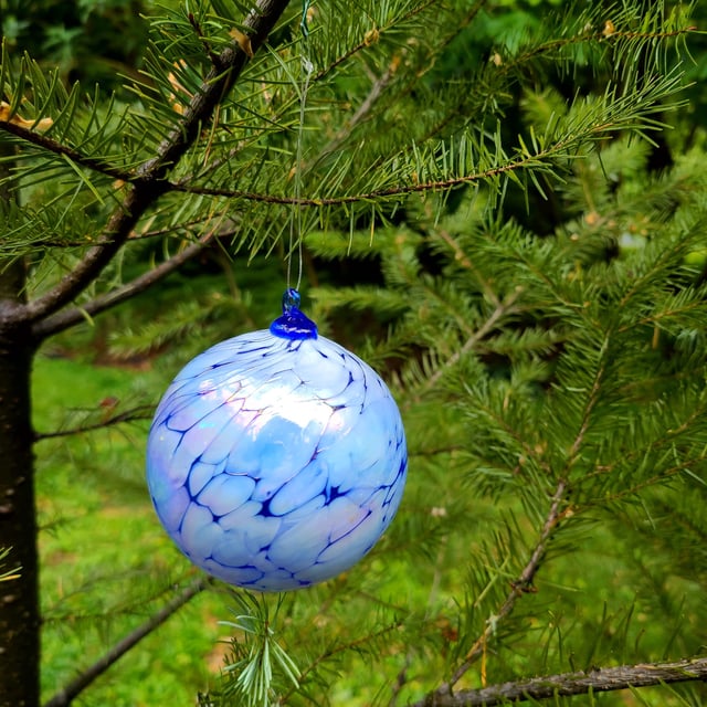 A Christmas ornament made from glass that includes ash from the 1980 eruption of Mt. St. Helens. Many residents in Washington and Oregon who were there when the volcano erupted have such mementos.