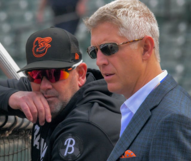 Baltimore Orioles manager Brandon Hyde speaks with Mike Elias, executive vice president and general manager for the ballclub during Game 2 of the American League Division Series at Oriole Park at Camden Yards Sunday Oct. 8, 2023.   (Karl Merton Ferron/Baltimore Sun Staff)