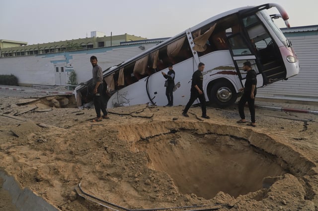 Palestinians inspect the site of an Israeli army airstrike on the European hospital in Khan Younis, Gaza Strip, Tuesday, May 13, 2025. The Israeli military said it had carried out a strike targeting what it said was a Hamas &#34;command and control center&#34; located beneath the hospital.