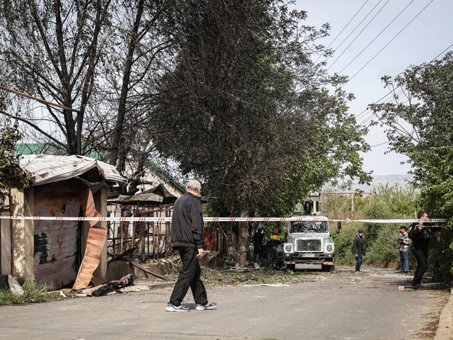 A man stands at a caution tape sealing off a house destroyed by a Russian drone attack in Odesa region, Ukraine, on May 16, 2025. (Photo by Nina Liashonok/Ukrinform) NO USE RUSSIA. NO USE BELARUS. (Photo by Ukrinform/NurPhoto via Getty Images)