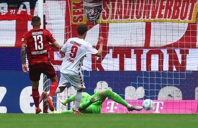 Soccer Football - 2. Bundesliga - FC Cologne v 1.FC Kaiserslautern - RheinEnergieStadion, Cologne, Germany - May 18, 2025 FC Cologne's Luca Waldschmidt scores their second goal REUTERS/Leon Kuegeler