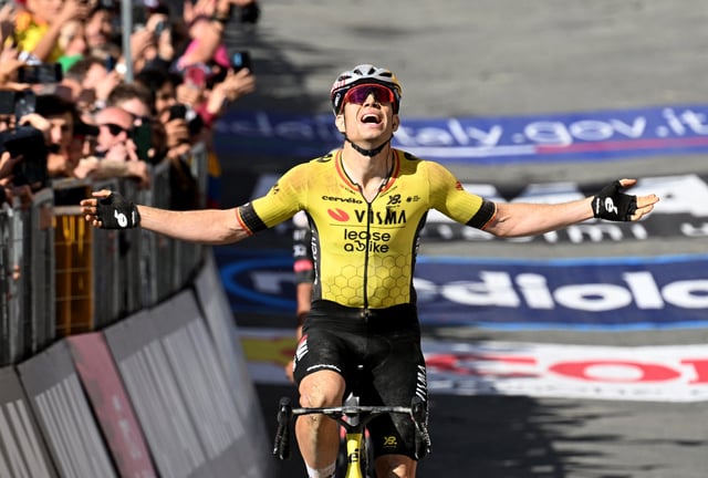 Cycling - Giro d'Italia - Stage 9 - Gubbio to Siena - Italy - May 18, 2025 Team Visma | Lease a Bike's Wout Van Aert reacts as he crosses the finish line to win stage 9 REUTERS/Jennifer Lorenzini