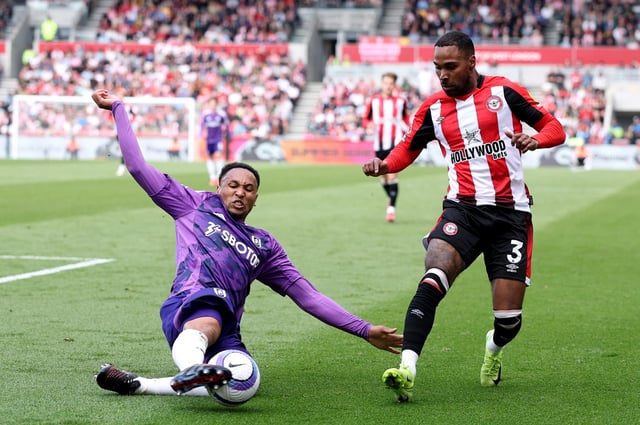 Soccer Football - Premier League - Brentford v Fulham - GTech Community Stadium, London, Britain - May 18, 2025 Fulham's Kenny Tete in action with Brentford's Rico Henry REUTERS/Toby Melville