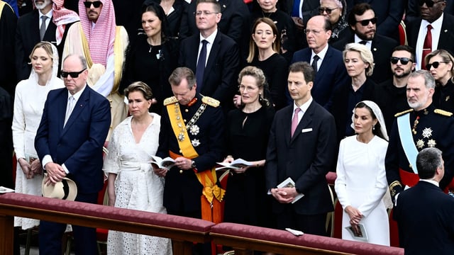 Princess Charlene, Queen Letizia, and Queen Mathilde met Pope Leo XIV in St. Peter's Square after his inauguration mass. (Photo by Filippo MONTEFORTE / AFP)