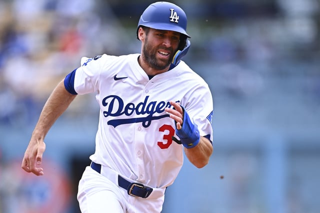 Apr 27, 2025; Los Angeles, California, USA; Los Angeles Dodgers outfielder Chris Taylor (3) scores from second base against the Pittsburgh Pirates during the sixth inning at Dodger Stadium. Mandatory Credit: Jonathan Hui-Imagn Images/File Photo