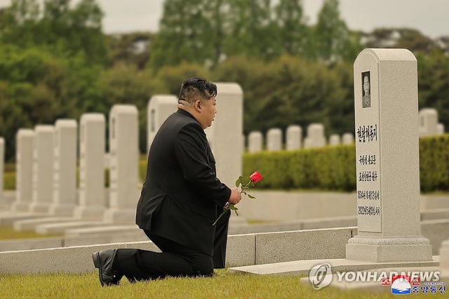This file photo, published by the Korean Central News Agency, shows North Korean leader Kim Jong-un laying a flower at the Patriotic Martyrs Cemetery in Sinmi-ri on May 19, 2024, to commemorate the second anniversary of Hyon Chol-hae's death. (For Use Only in the Republic of Korea. No Redistribution) (Yonhap)