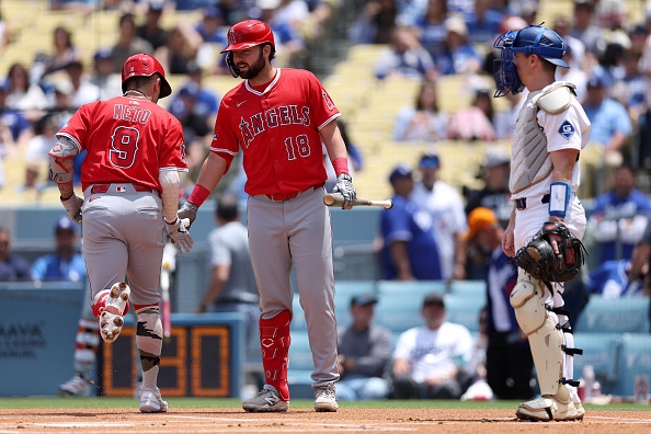 LOS ANGELES, CALIFORNIA – MAY 18: Zach Neto #9 of the Los Angeles Angels celebrates his home run with teammate Nolan Schanuel #18 as Will Smith #16 of the Los Angeles Dodgers looks on during the first inning at Dodger Stadium on May 18, 2025 in Los Angeles, California. (Photo by Katelyn Mulcahy/Getty Images)