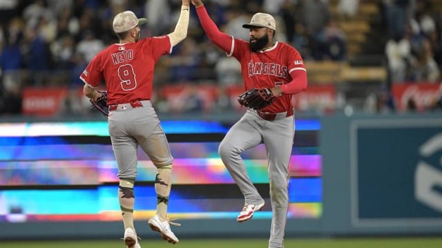 Los Angeles Angels shortstop Zach Neto (9) and right fielder Jo Adell (7) © Jayne Kamin-Oncea-Imagn Images