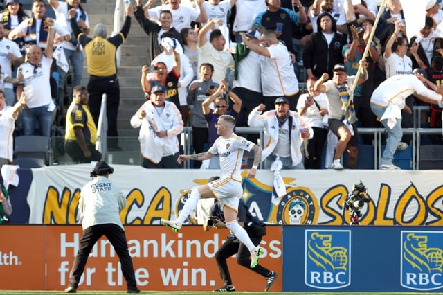 Galaxy forward Marco Reus, bottom center, jumps in the air after scoring a goal against the LAFC during the first half of an MLS soccer match at Dignity Health Sports Park in Carson, Calif. on Sunday, May 18, 2025.  (Photo by Raul Romero Jr., Contributing Photographer)