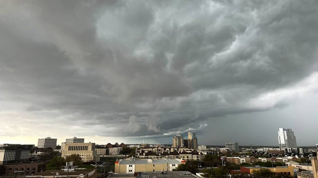 Storm clouds gather above the Fort Worth Cultural District on March 16, 2023.