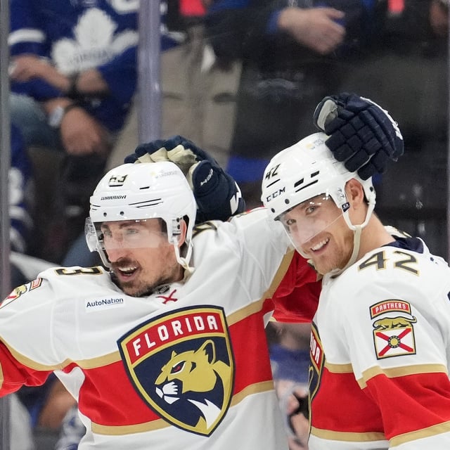 Florida Panthers centre Brad Marchand (left) celebrates his empty-net goal with teammate Gustav Forsling during third period NHL Stanley Cup playoff hockey game against the Toronto Maple Leafs, in Toronto, May 18.