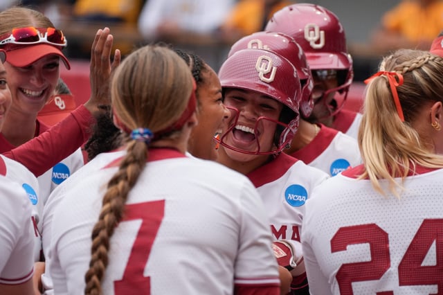 Oklahoma's Ailana Agbayani (50) celebrates after hitting a three-run home run in the second inning of a softball game in the Norman Regional of the NCAA Tournament.