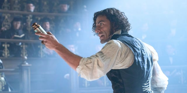 Oscar Isaac at a medical symposium in Frankenstein 