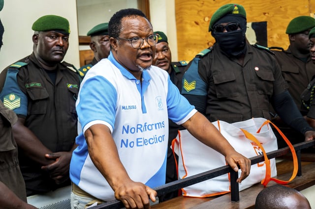 Tanzania's main opposition leader Tundu Lissuat, appears at Kisutu magistrate's court in Dar es Salaam, Tanzania Monday, May 19, 2025. (AP Photo/Derick Katunzi)