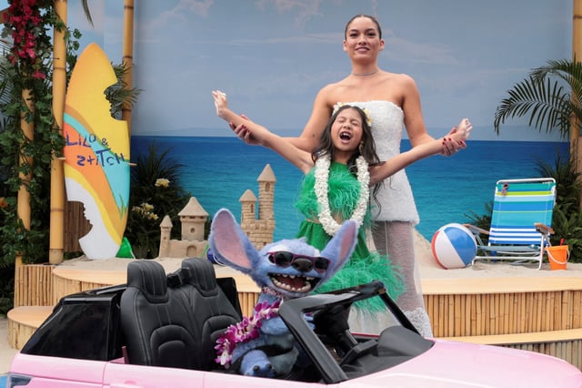 Maia Kealoha, Sydney Agudong and Stitch attend a premiere for the film "Lilo & Stitch" in Los Angeles, California, U.S. May 17, 2025. REUTERS/Mario Anzuoni/File Photo