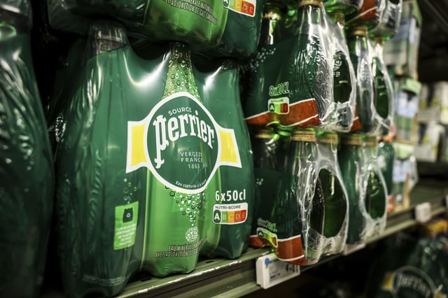 Bottles of Perrier are pictured in a supermarket, as a French Senate inquiry commission said the government of President Emmanuel Macron covered up decisions over the illegal treatment of mineral water by food industry giant Nestle, Monday, May 19, 2025 in Paris. (AP Photo/Thomas Padilla)