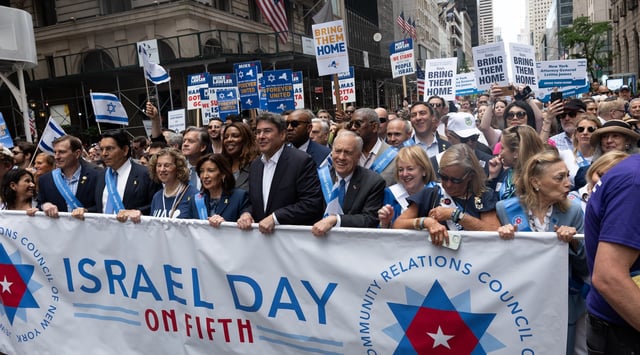 A number of politicians marched during Israel Day on Fifth, including Gov. Kathy Hochul (fifth from left), Rep. Dan Goldman (second from left) and Israeli Consul General in New York Ofir Akunis (sixth from left). (Joseph Strauss)