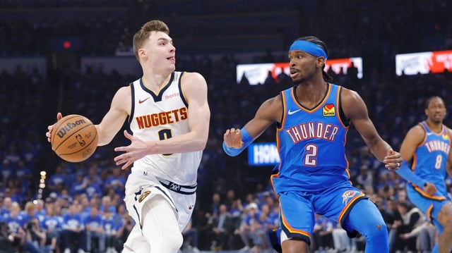 Denver Nuggets guard Christian Braun (left) drives past Oklahoma City Thunder guard Shai Gilgeous-Alexander during Game 7 of the 2025 NBA Playoffs.