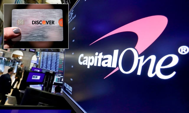 FILE - The logo for Capital One Financial is displayed above a trading post on the floor of the New York Stock Exchange, July 30, 2019. Capital One Financial is buying Discover Financial Services for $35 billion, in a deal that would bring together two of the nation&#39;s biggest lenders and credit card issuers, according to a news release issued by the companies Monday, Feb. 19, 2024.   (AP Photo/Richard Drew, File)