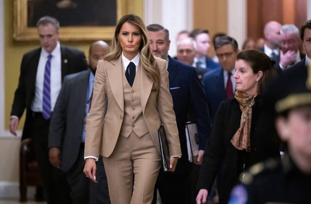 US First Lady Melania Trump walks to a meeting to urge passage of the Take It Down Act by the US Senate which protects victims of real and deepfake “revenge pornography” by criminalizing their publication, at the US Capitol in Washington, DC, on March 3, 2025. (Photo by SAUL LOEB / AFP)