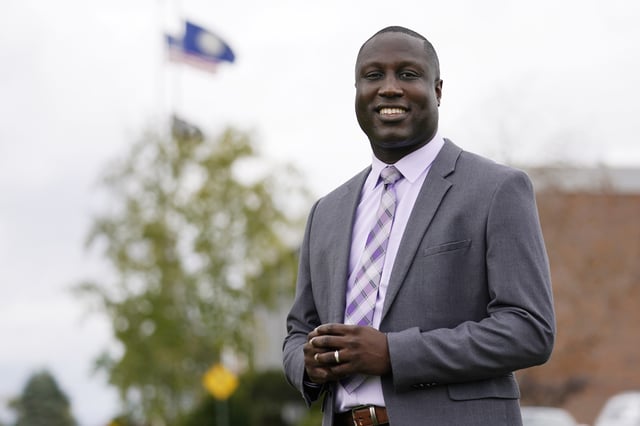 FILE - Mark Brave smiles as he poses outside the Strafford County Courthouse, Oct. 6, 2020, in Dover, N.H. (AP Photo/Charles Krupa, File)