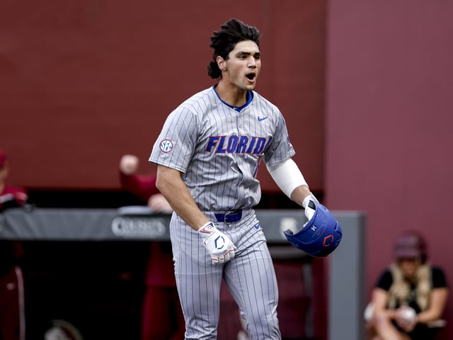 TALLAHASSEE, FL - APRIL 09: First baseman Jac Caglianone #14 of the Florida Gators celebrates after hitting a home run during the game against the Florida State Seminoles on Mike Martin Field at Dick Howser Stadium on April 9, 2024 in Tallahassee, Florida. The #10 Seminoles defeated the #24 Gators 19 to 4.