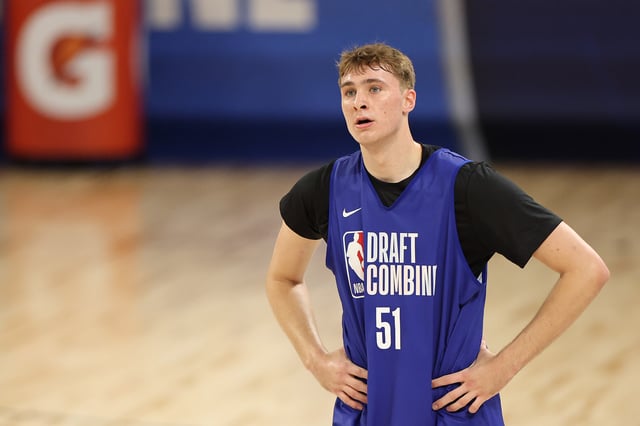 Cooper Flagg #51 looks on during the 2025 NBA Draft Combine at Wintrust Arena on May 13, 2025 in Chicago, Illinois.