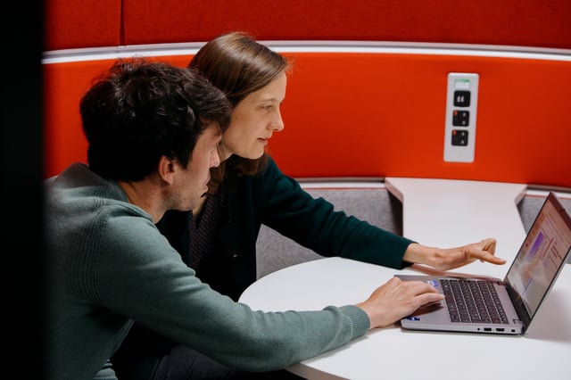 Ségolène Berthou, a climate researcher at the Met Office working with one of her colleagues. Berthou’s specialty is the interaction between the ocean and the atmosphere. Photo by Chris Welsch for Microsoft.