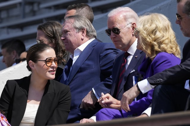 President Joe Biden talks with first lady Jill Biden and their granddaughter Naomi Biden as he attends his granddaughter Maisy Biden&#39;s commencement ceremony at the University of Pennsylvania in Philadelphia, Monday, May 15, 2023.