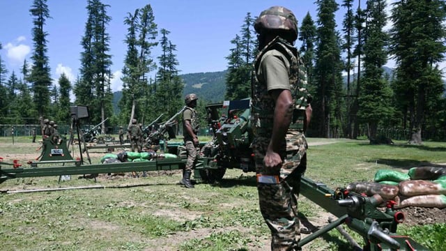 Indian army personnel near the Line of Control (LoC) in Kashmir on Monday. (AFP)