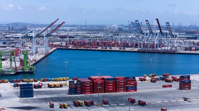 Cranes at the Port of Los Angeles are empty of cargo ships as shown with a drone at in San Pedro California, U.S., May 13, 2025. REUTERS/Mike Blake/File Photo