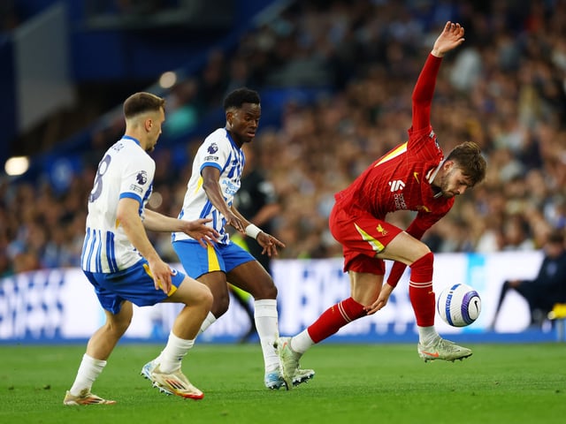 Soccer Football - Premier League - Brighton & Hove Albion v Liverpool - The American Express Community Stadium, Brighton, Britain - May 19, 2025 Liverpool's Conor Bradley in action with Brighton & Hove Albion's Brajan Gruda and Simon Adingra Action Images via Reuters/Matthew Childs