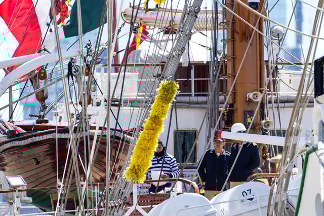 Members of the Mexican Navy training vessel Cuauhtemoc are seen on board during investigations after it struck the Brooklyn Bridge over the weekend in New York City, U.S., May 19, 2025.  REUTERS/Eduardo Munoz