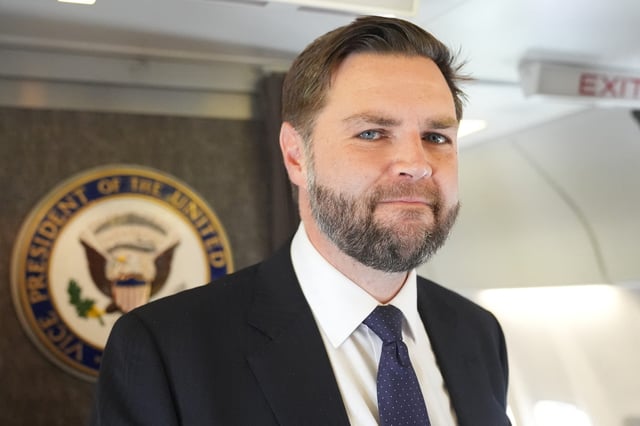 Vice President JD Vance speaks to reporters on Air Force Two at Leonardo da Vinci International Airport in Rome on May 19, 2025.