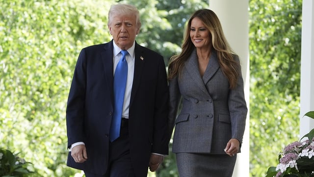 President Donald Trump, left, and first lady Melania Trump arrive to speak during a bill signing event for the “Take it Down Act” in the Rose Garden of the White House, Monday, May 19, 2025, in Washington. 