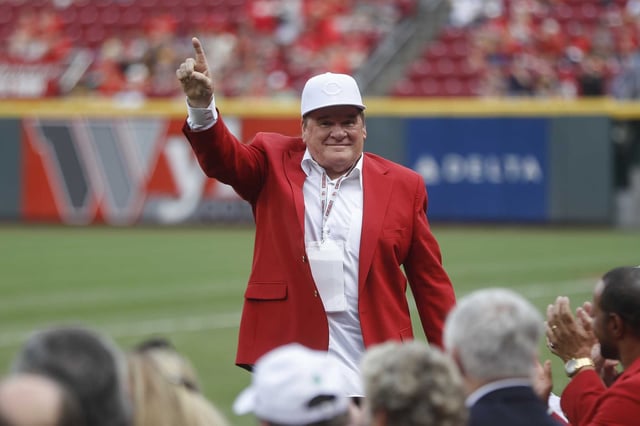 Former Cincinnati Reds player and guest Pete Ross acknowledges spectators during a Cincinnati Reds Hall of Fame induction ceremony before a baseball game against the Pittsburgh Pirates, Saturday, July 21, 2018, in Cincinnati.
