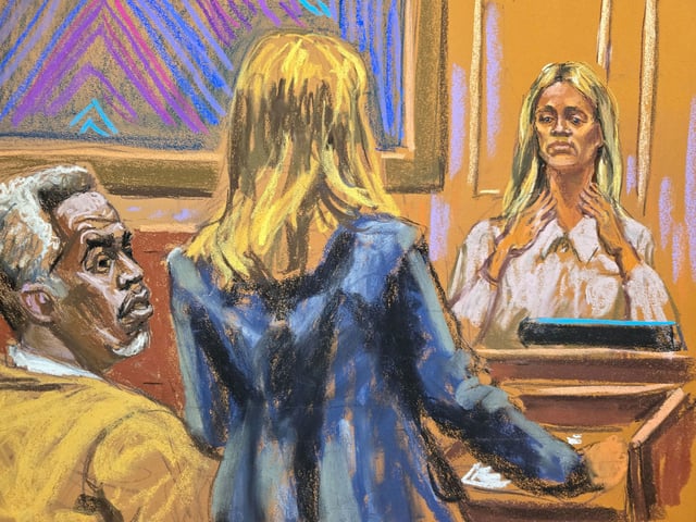 Assistant US Attorney Meredith Foster questions Kerry Morgan on Monday.