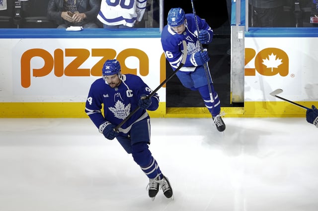 May 18, 2025; Toronto, Ontario, CAN; Toronto Maple Leafs forward Auston Matthews (34) and forward Mitch Marner (16) take to the ice for warm up before game seven of the second round of the 2025 Stanley Cup Playoffs against the Florida Panthers at Scotiabank Arena. Mandatory Credit: John E. Sokolowski-Imagn Images
