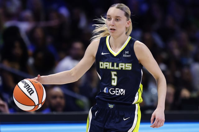 Paige Bueckers #5 of the Dallas Wings handles the ball against the Minnesota Lynx during the second half at College Park Center on May 16, 2025 in Arlington, Texas.