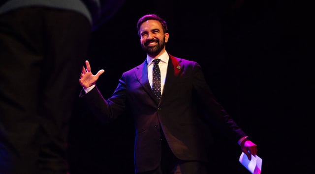 New York City mayoral candidate Zohran Mamdani arrives onstage at a Brooklyn rally in May 2025. (Madison Swart and Hans Lucas via AFP/Getty Images)