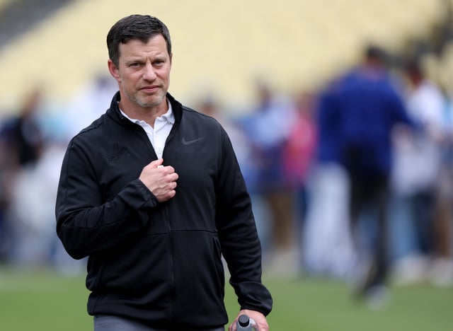 LOS ANGELES, CALIFORNIA - MAY 17: President of Baseball Operations for Andrew Friedman of the Los Angeles Dodgers on the field before the game against the Cincinnati Reds at Dodger Stadium on May 17, 2024 in Los Angeles, California.